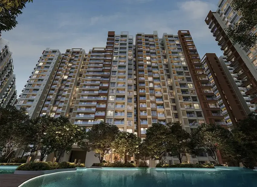 Towers rising above the pool at dusk